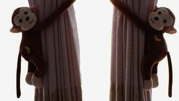 Pair of dark brown 30cm monkey curtain soft toy style tie back